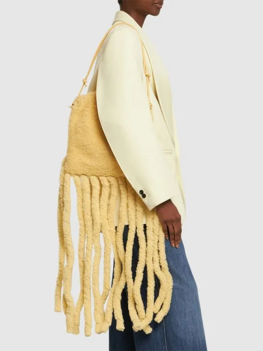 Bottega Veneta   Curly shearling fringed teddy clutch 