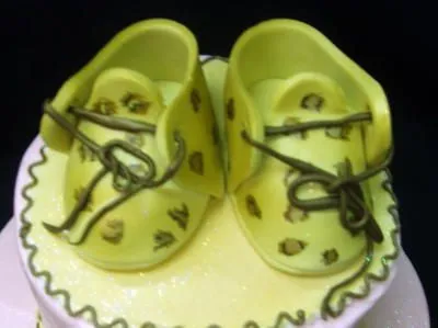 Cheetah Print Baby Booties on Celebration Tier Cake